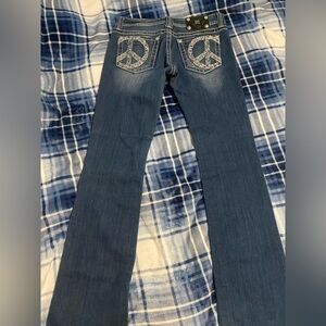 Women's Blue Jeans with Embroidered Peace Sign Pockets